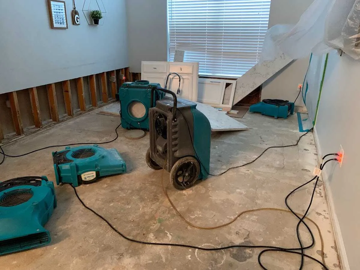 Dehumidifier in flood-cut room for Water Damage Restoration in Pepper Pike